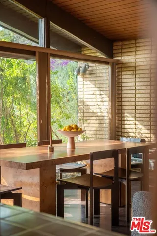 a view of a room with a large window