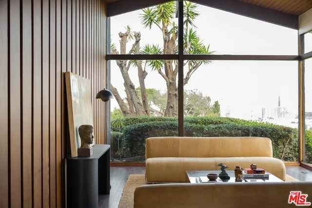 a view of a balcony with furniture