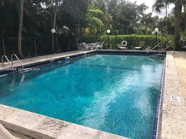 a view of a lake with a yard