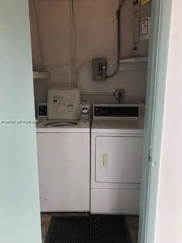 a close view of a sink and dishwasher in a kitchen