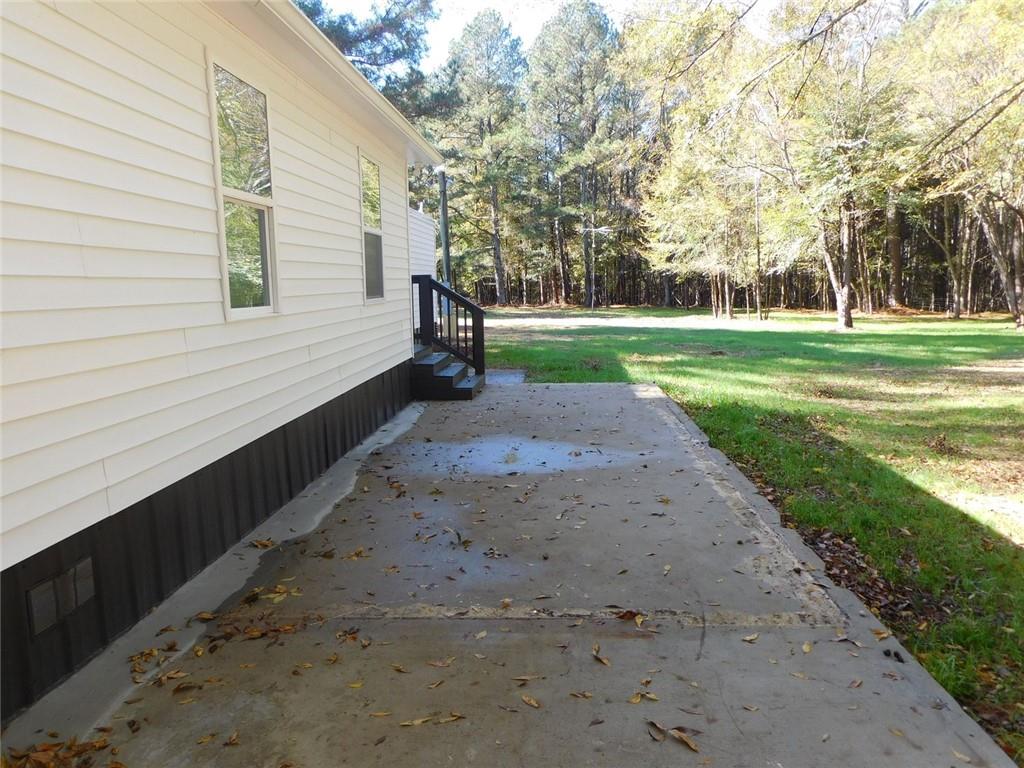 1101 Boswell Road Union Point, GA 30669 - Photo 20 of 60 a view of a park with large trees