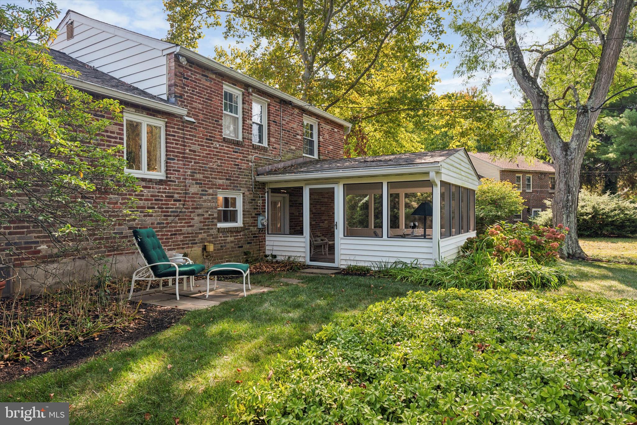 319 Landsende Road Devon, PA 19333 - Photo 23 of 27 Porch and small blue stone patio