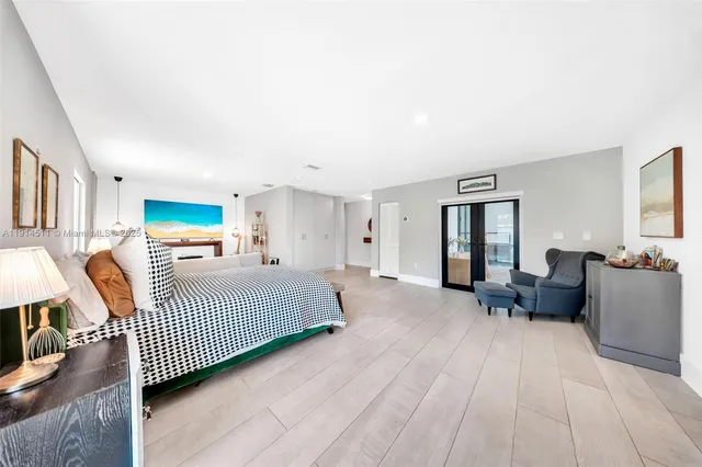 a view of a hallway with wooden shelves