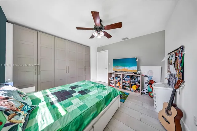 a view of a backyard with a patio and plants