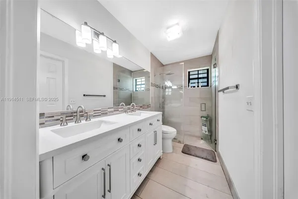 an aerial view of residential building with parking space