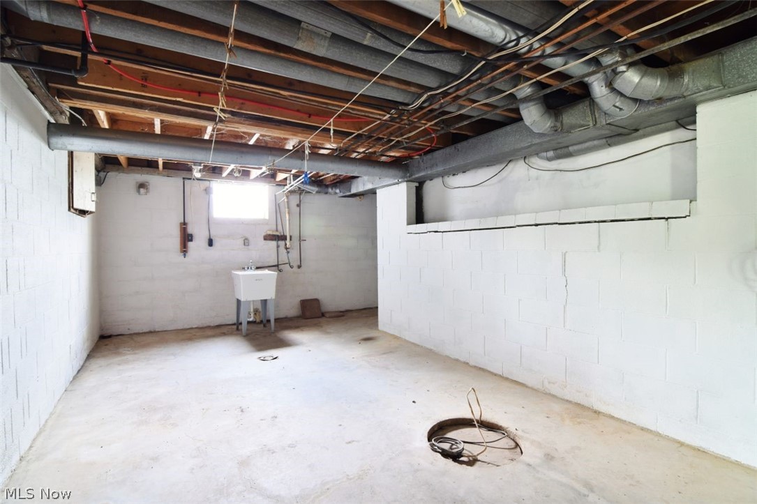 7251 Ryan Road Medina, OH 44256 - Photo 46 of 47 Unfinished basement with concrete flooring and painted block walls