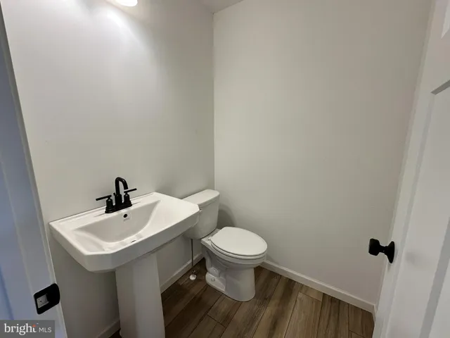 a bathroom with a sink and a toilet