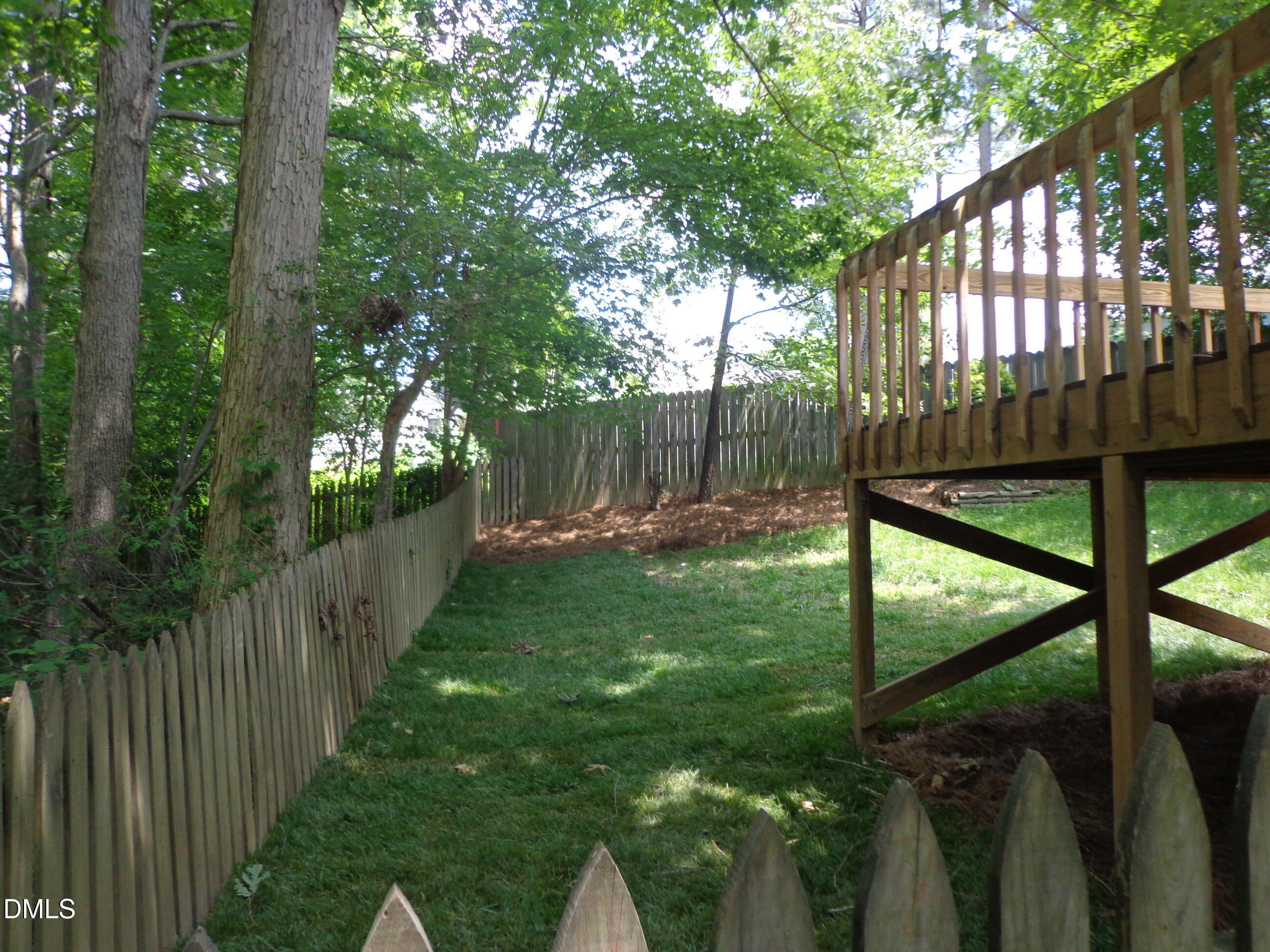 113 Tapestry Terrace Cary, NC 27511 - Photo 7 of 8 a view of a backyard
