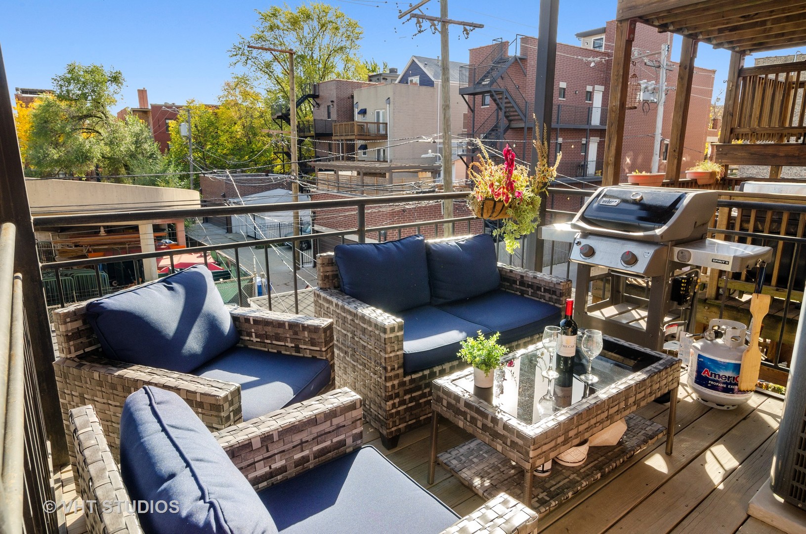 1137 West Addison Street, Unit 2 Chicago, IL 60613 - Photo 13 of 19 a view of city from balcony with seating space