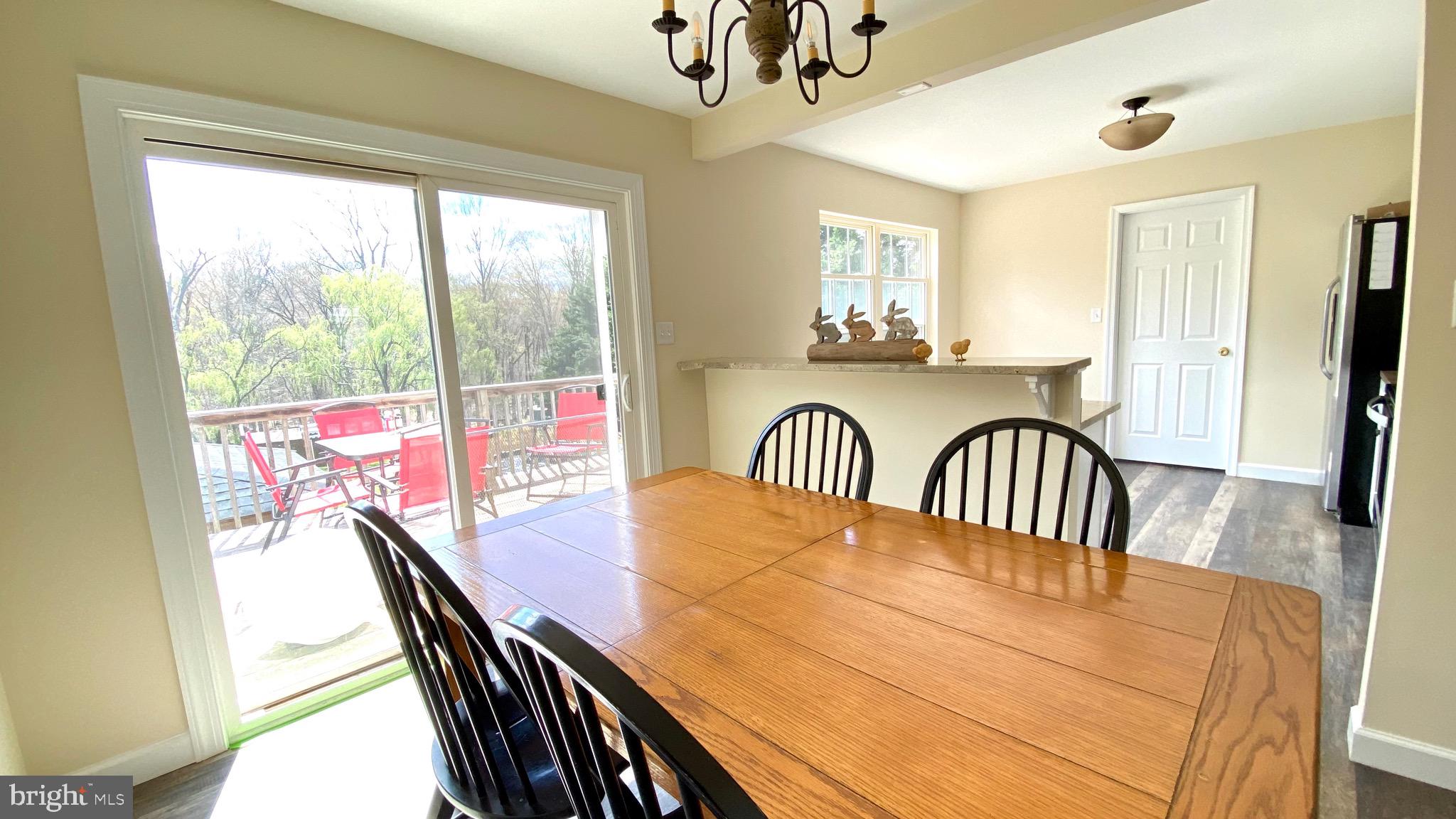 274 Hitching Post Drive Rising Sun, MD 21911 - Photo 8 of 29 a view of a dining room with furniture window and wooden floor
