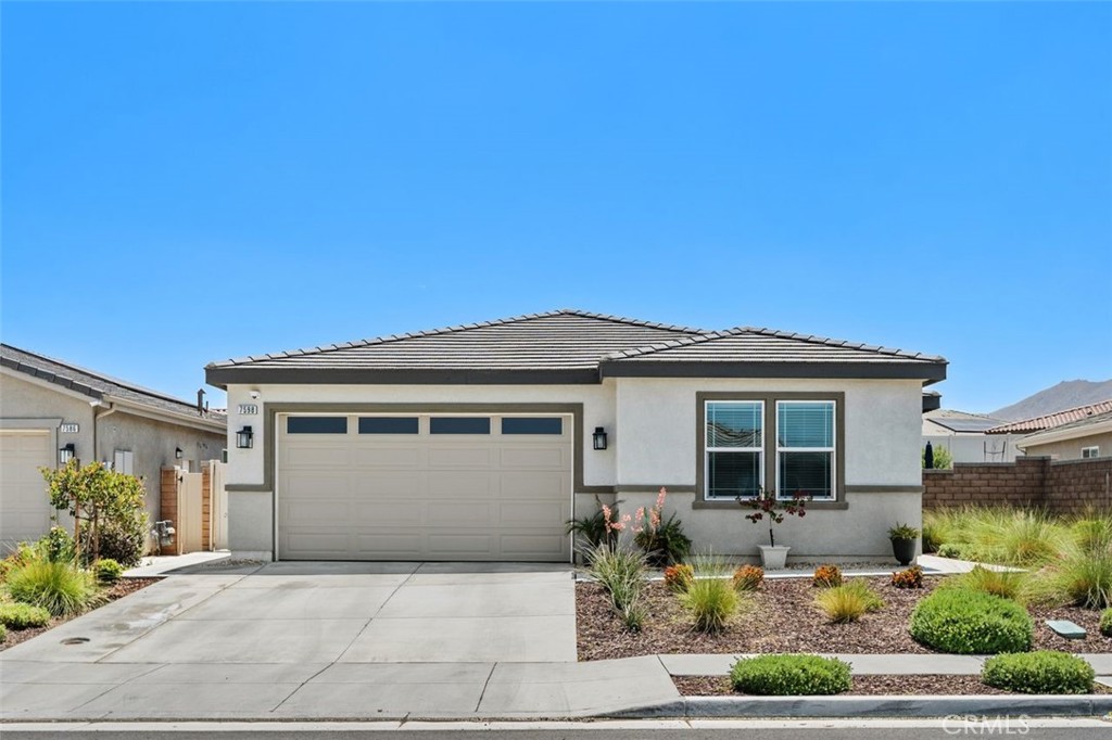 7598 Orangebrook Cove Riverside, CA 92507 - Photo 4 of 45 2 car Garage with Roll-up Door