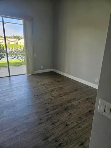 a view of an empty room and window