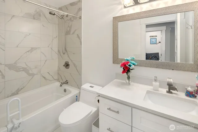 a view of hallway with window and furniture