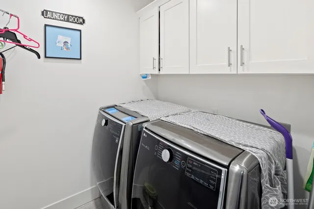 an outdoor space with furniture and umbrella