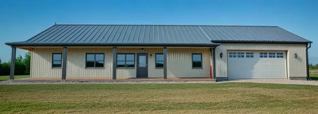 a view of a house with backyard