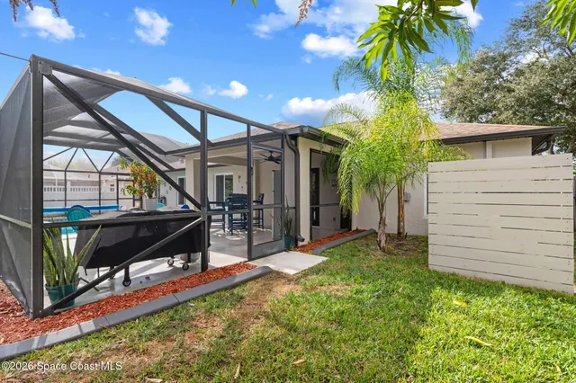 a view of a swimming pool with a porch
