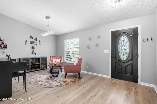 a room with furniture and a window