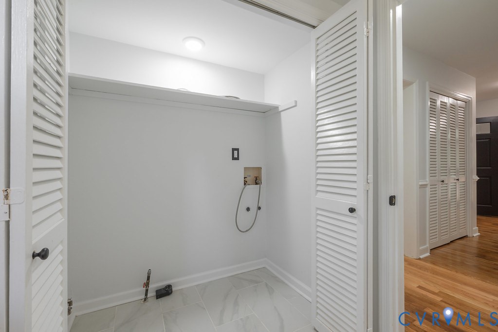 11840 Winfore Drive Midlothian, VA 23113 - Photo 14 of 40 Laundry closet featuring louvered bi-fold doors, a