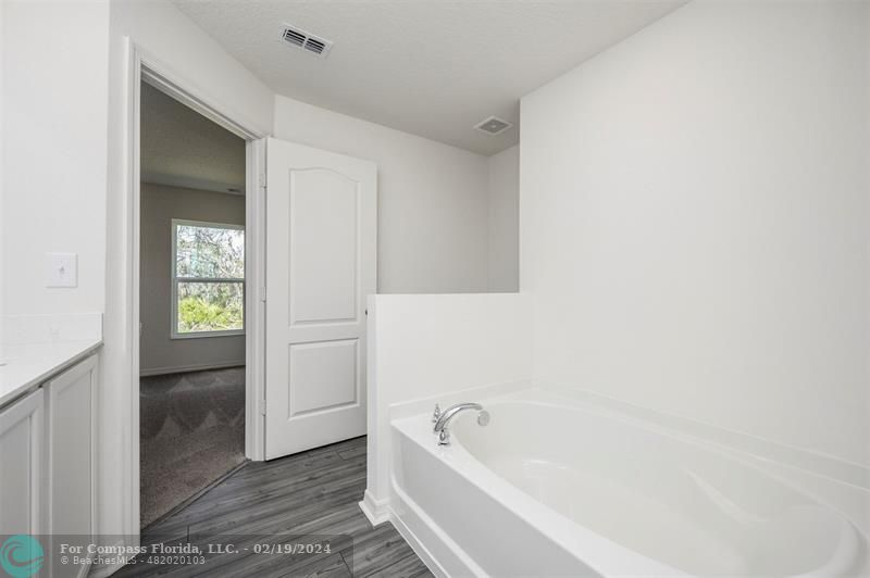 5236 Imagination Drive Fort Pierce, FL 34947 - Photo 17 of 19 a bathroom with a bathtub and shower