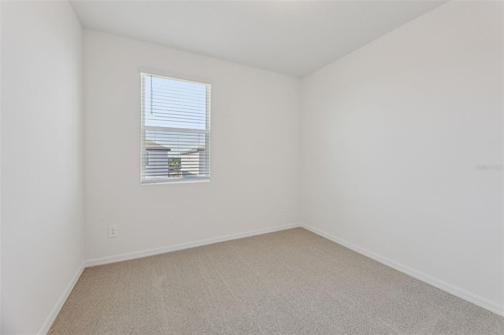 4574 Homestead Trail St. Cloud, FL 34772 - Photo 20 of 31 an empty room with a window
