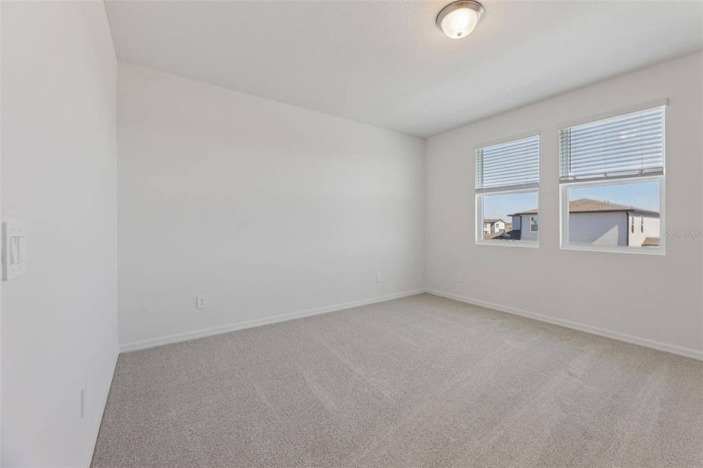 4574 Homestead Trail St. Cloud, FL 34772 - Photo 25 of 31 an empty room with a window