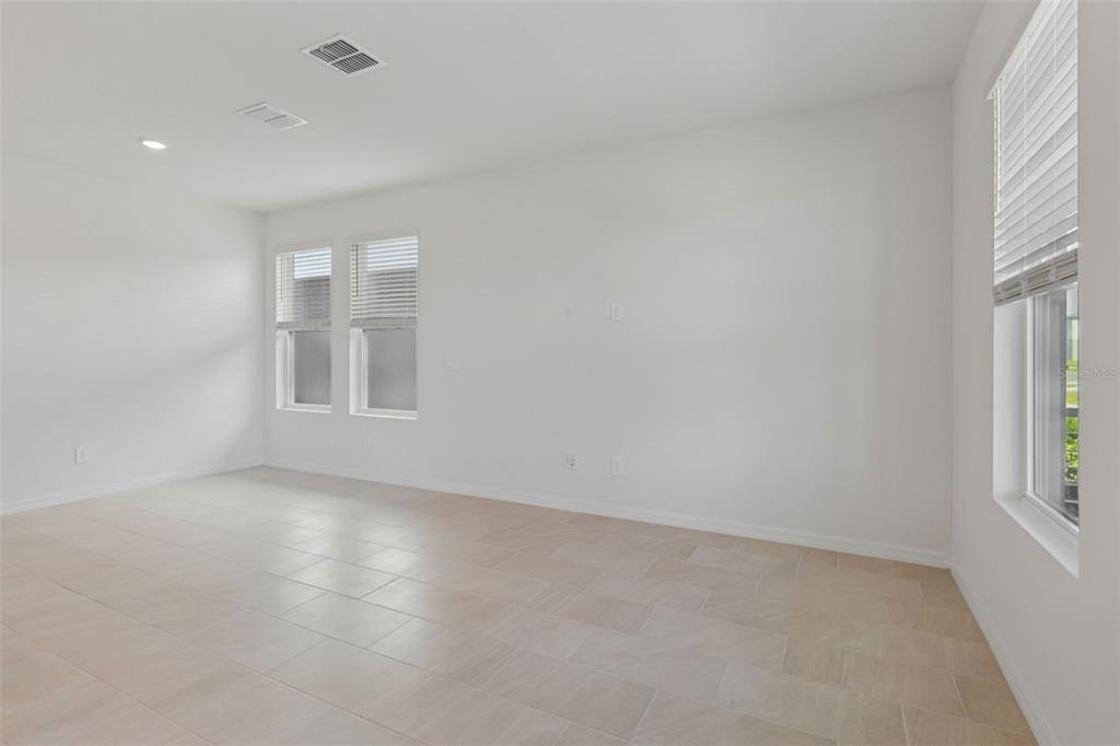 4574 Homestead Trail St. Cloud, FL 34772 - Photo 7 of 31 an empty room with windows