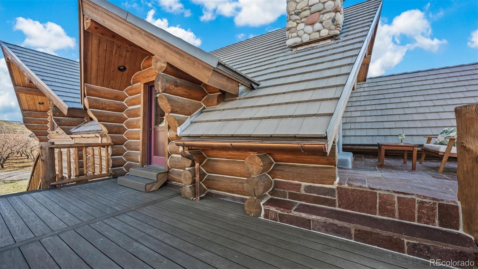 3875 F F 3/4 Road Palisade, CO 81526 - Photo 32 of 45 a view of a house with wooden deck
