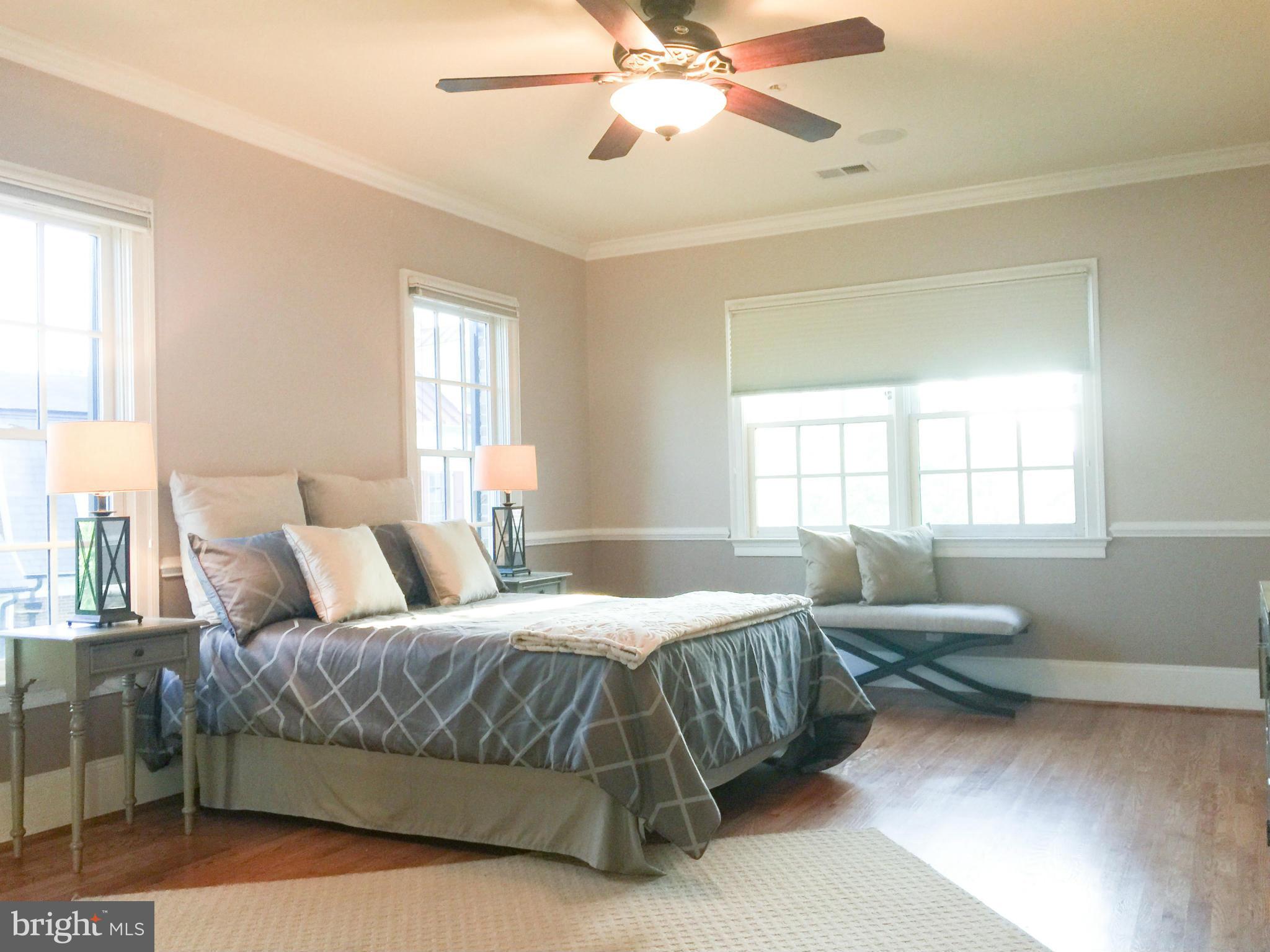 1728 Carpenter Road Alexandria, VA 22314 - Photo 16 of 29 a bedroom with a bed and window