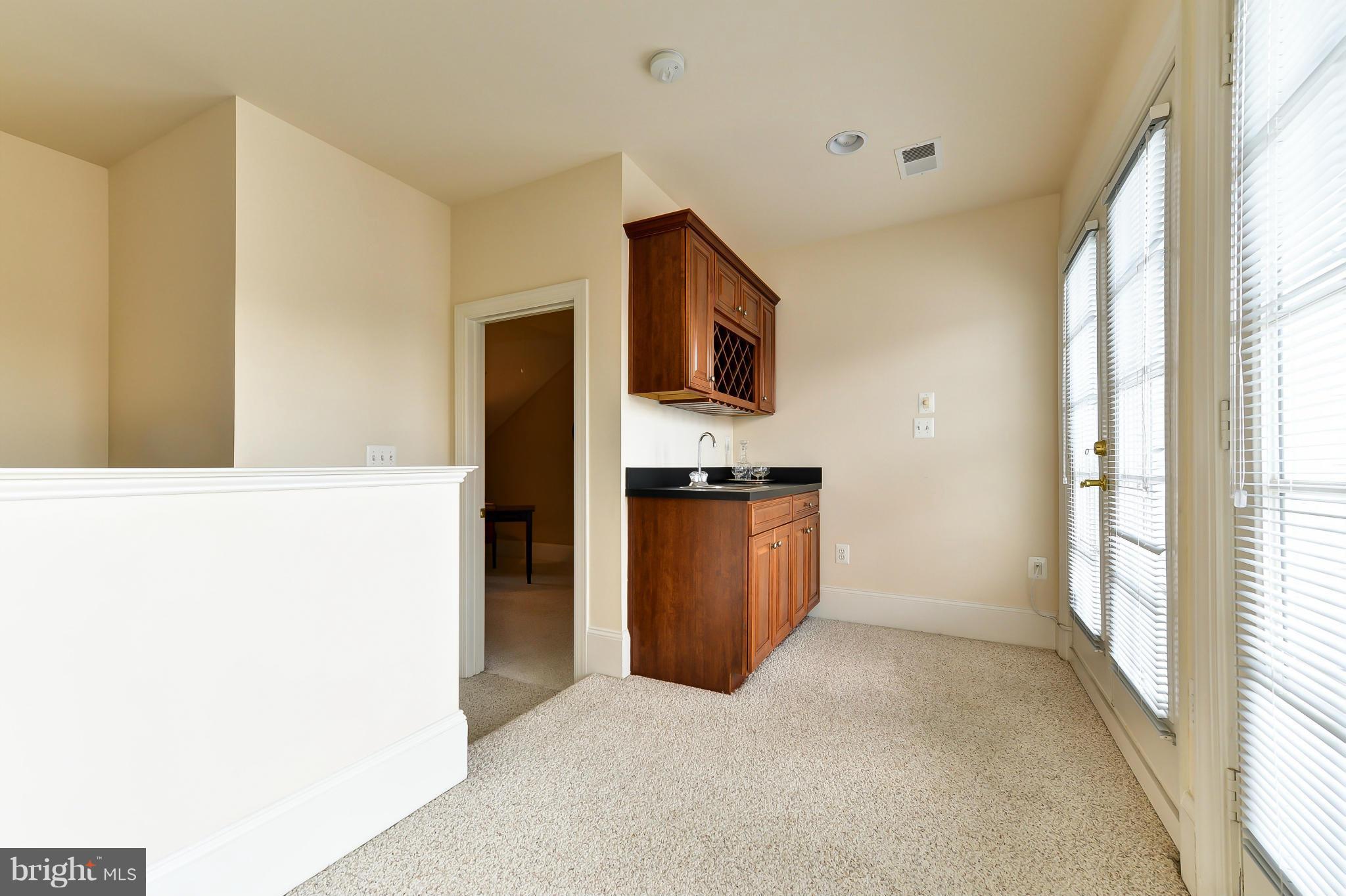 1728 Carpenter Road Alexandria, VA 22314 - Photo 26 of 29 a view of kitchen with sink and refrigerator