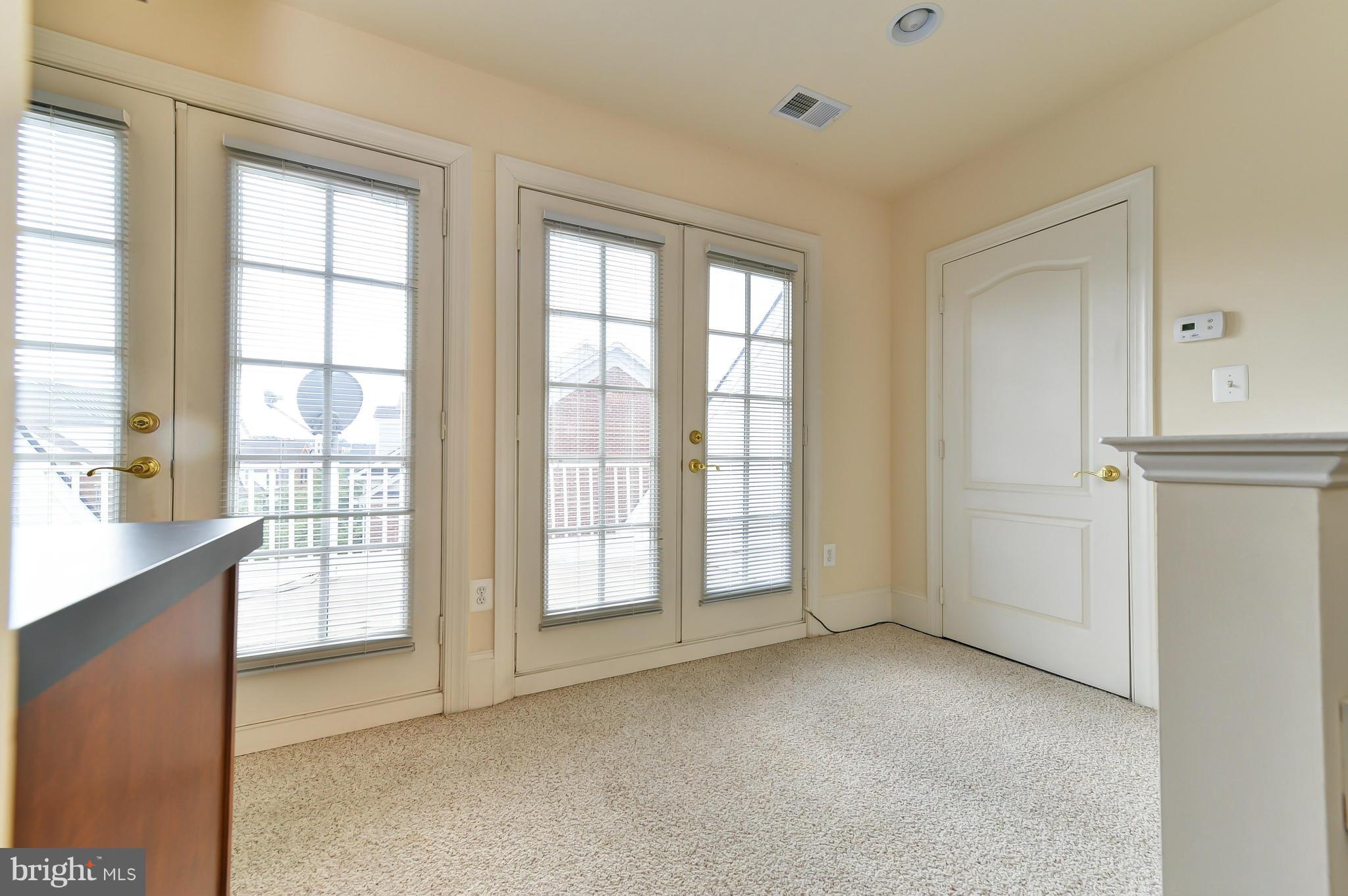 1728 Carpenter Road Alexandria, VA 22314 - Photo 27 of 29 a view of an empty room with a window