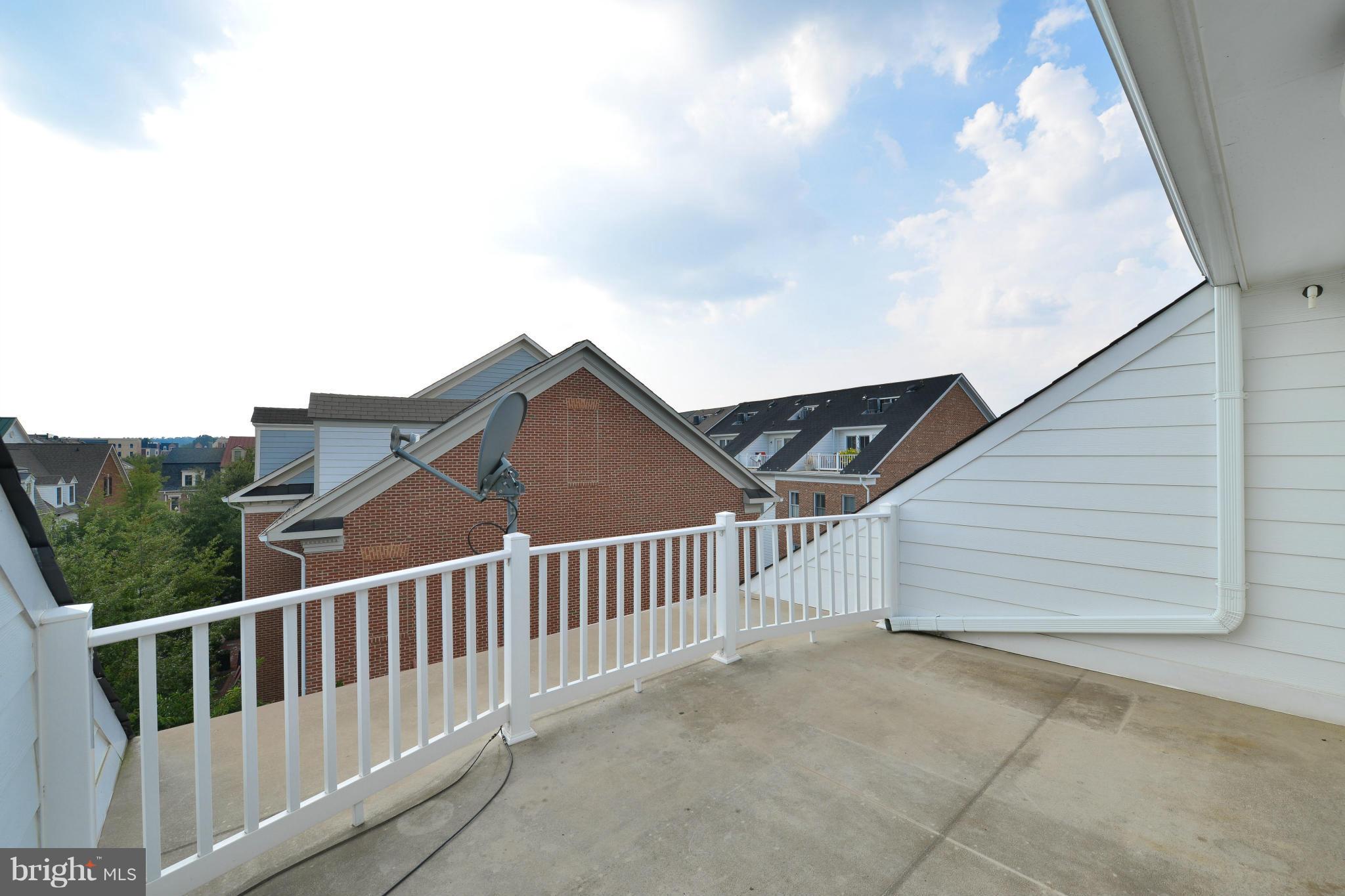 1728 Carpenter Road Alexandria, VA 22314 - Photo 29 of 29 a view of a houses with a balcony