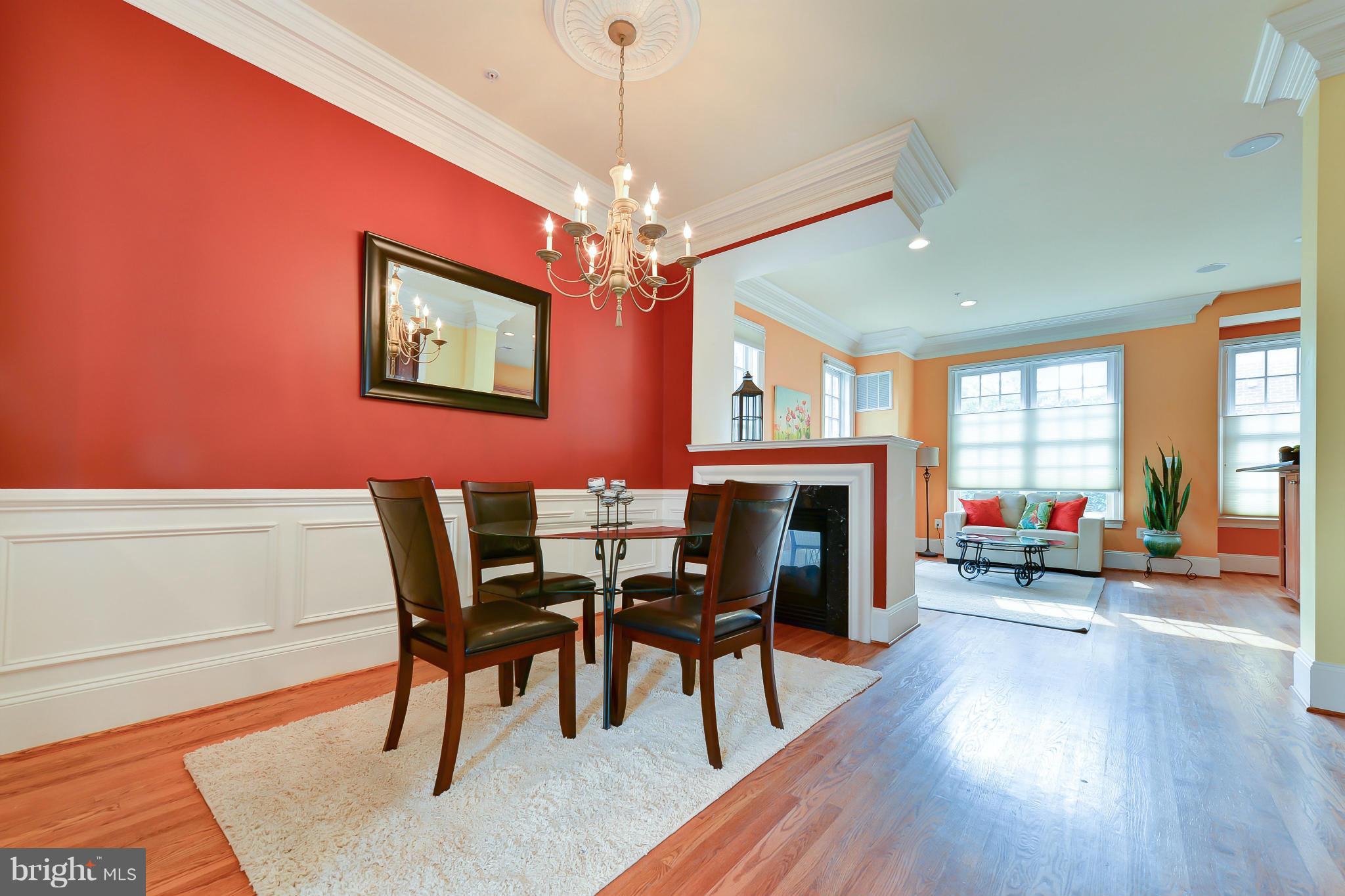 1728 Carpenter Road Alexandria, VA 22314 - Photo 7 of 29 a view of a dining room with furniture window and wooden floor