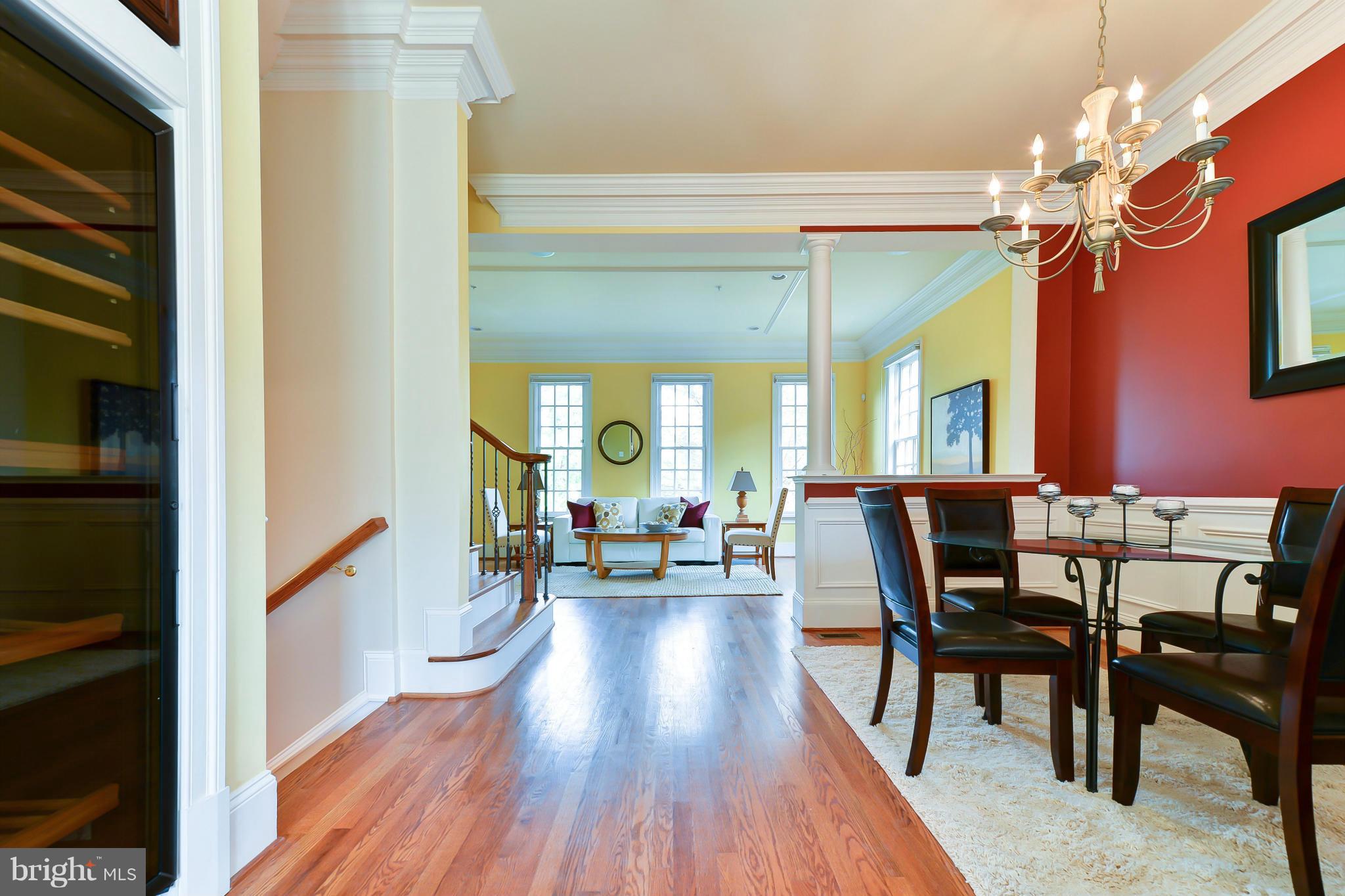 1728 Carpenter Road Alexandria, VA 22314 - Photo 10 of 29 a view of a dining room with furniture and wooden floor