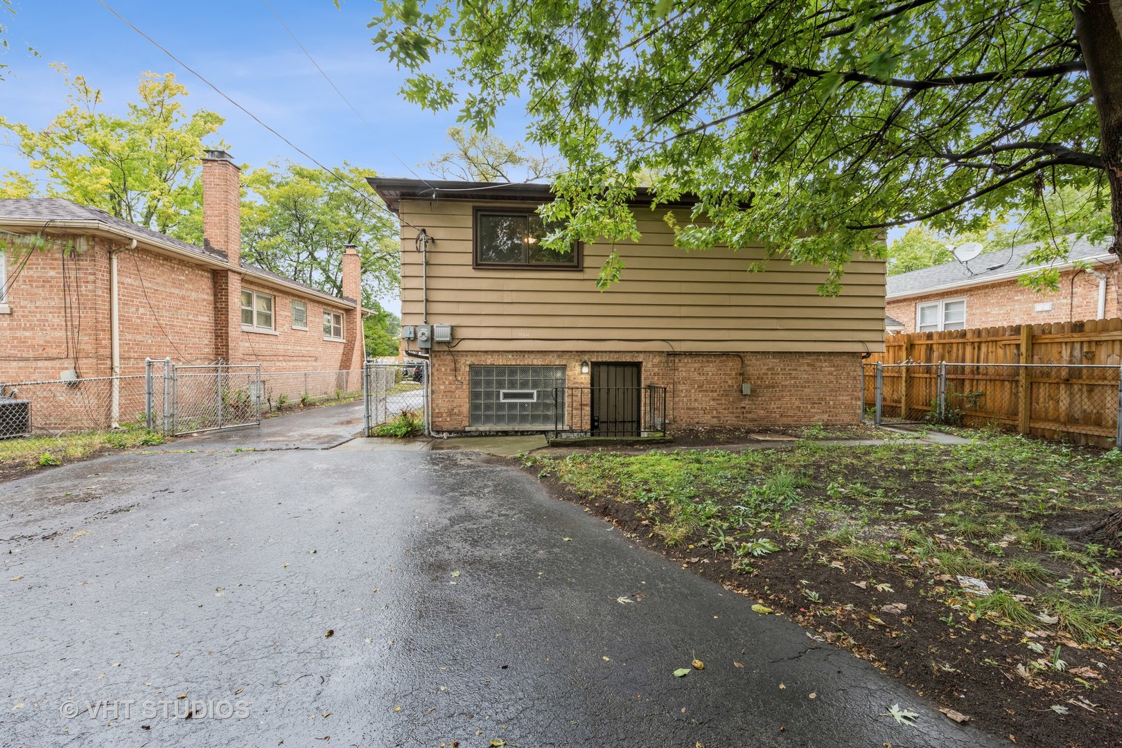 15117 Madison Avenue Dolton, IL 60419 - Photo 14 of 14 a front view of a house with garden