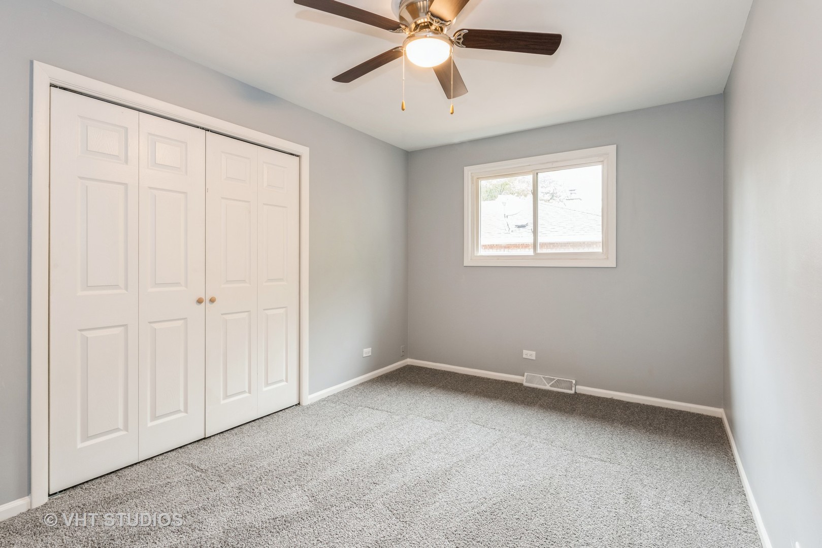 15117 Madison Avenue Dolton, IL 60419 - Photo 6 of 14 an empty room with fan and windows