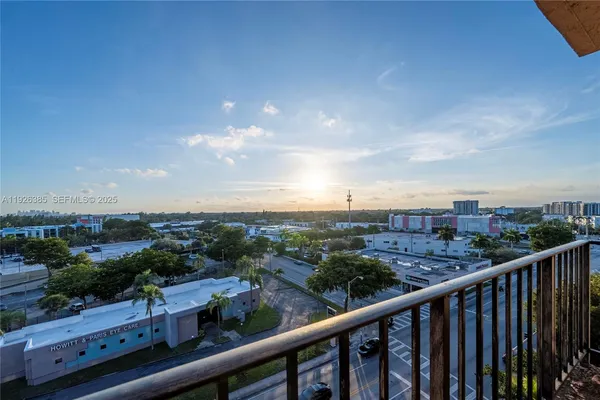 a view of a city skyline from a balcony