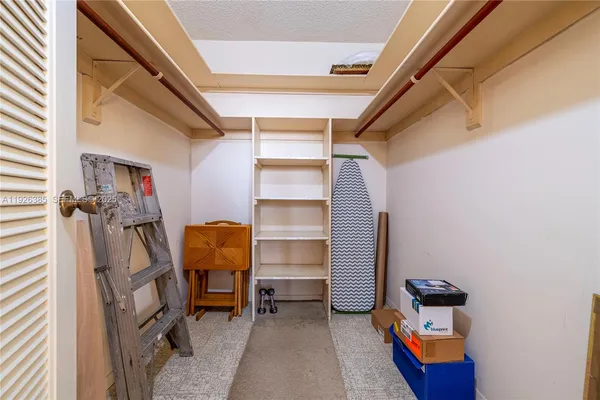 a room with storage and utility