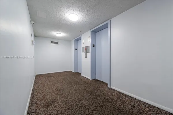 an empty room with an entryway