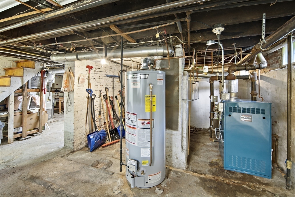 38 Spring Street Somerville, MA 02143 - Photo 17 of 37 a view of a room with gym equipment