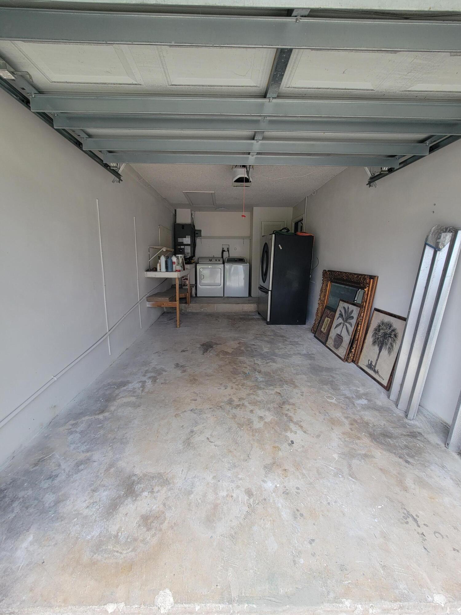 104 Arrowhead Circle Jupiter, FL 33458 - Photo 4 of 21 20251002_164355