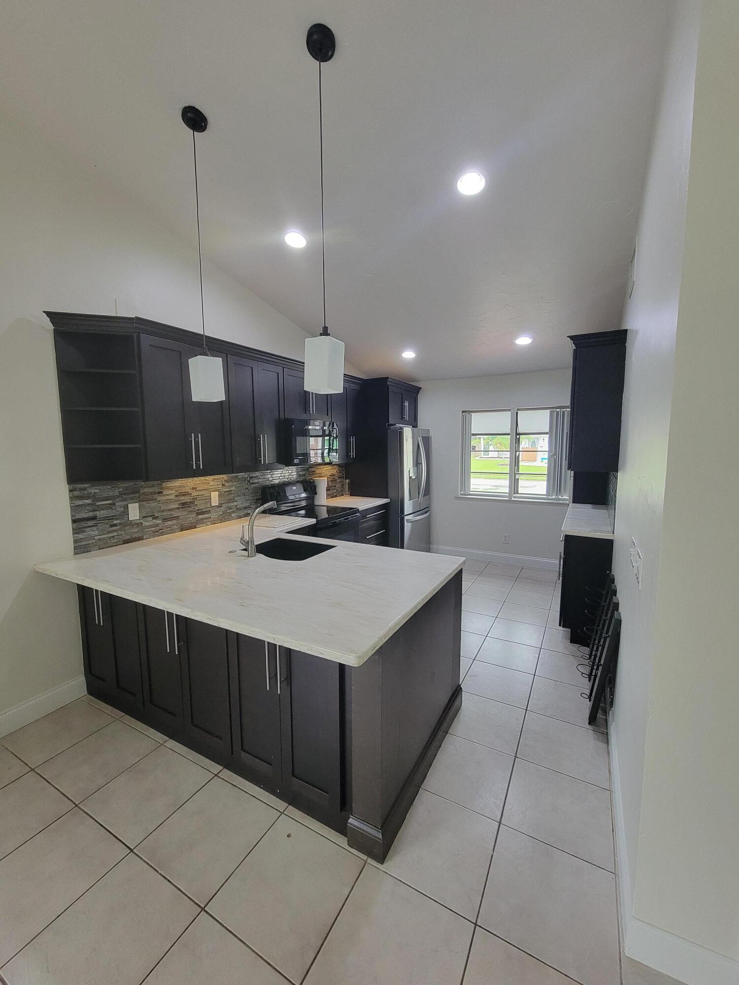 104 Arrowhead Circle Jupiter, FL 33458 - Photo 10 of 21 20251002_164857