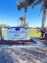 14 Loon Lane Placida, FL 33946 - Photo 2 of 5 a view of outdoor space with sign board