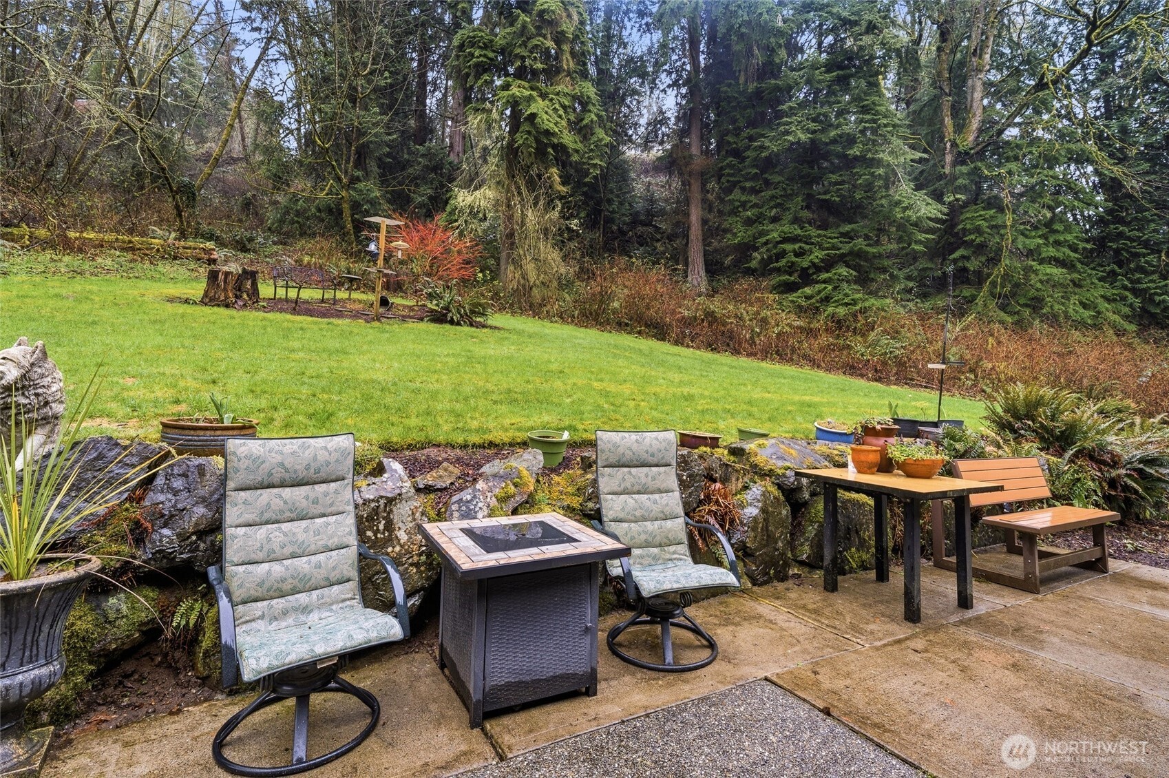 6830 Norma Beach Road Edmonds, WA 98026 - Photo 22 of 30 a view of a backyard with furniture and garden