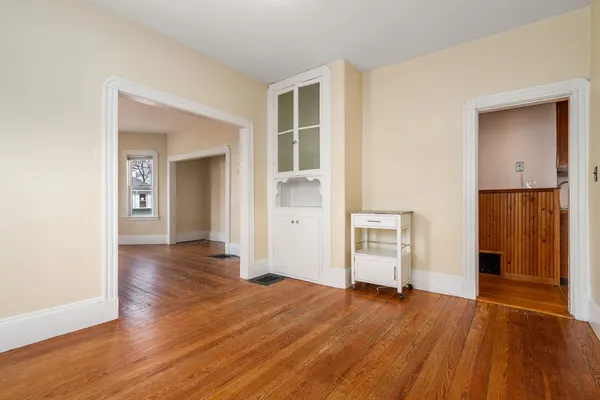 wooden floor & windows in a room