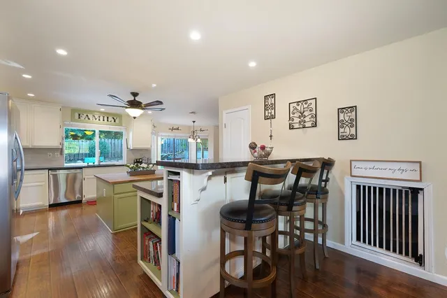 a room with a book shelf and a shelf