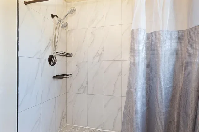 a view of living room with furniture and balcony