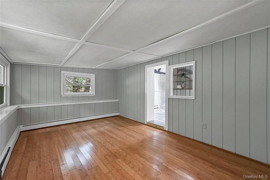 35 Peddler Hill Road Monroe, NY 10950 - Photo 16 of 23 Spare room with a baseboard heating unit and wood-type flooring