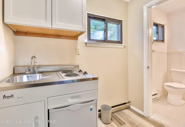 a bathroom with a sink and a toilet