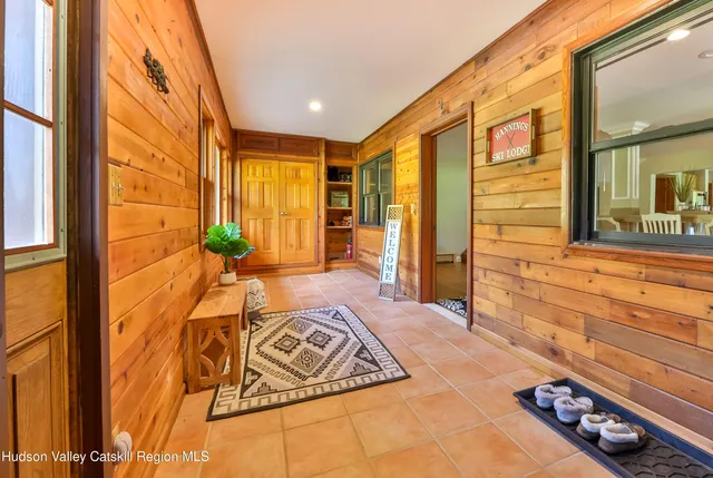 a view of a entryway door with the couch