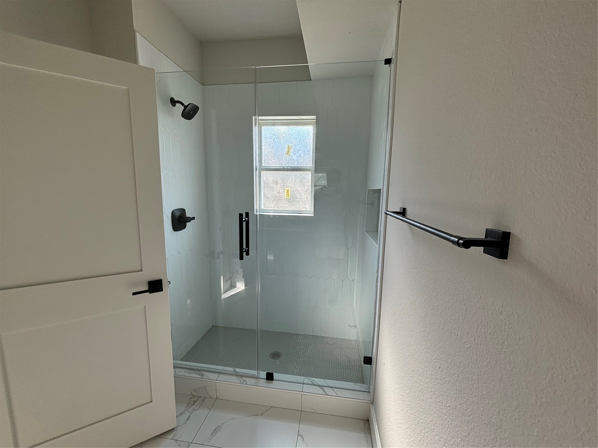 3604 Dennis Street Houston, TX 77004 - Photo 12 of 20 a bathroom with a shower and toilet